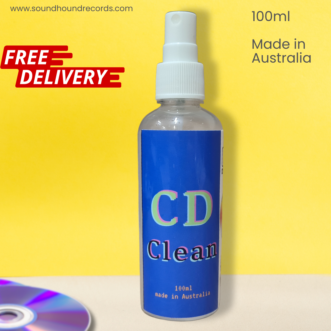 A 100ml CD Clean spray bottle with a blue label and white spray nozzle, set against a bright yellow background with promotional text overlays.