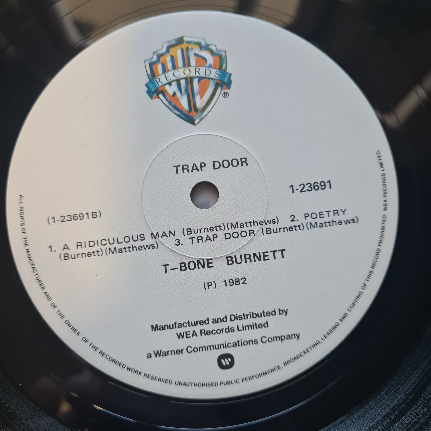 T-Bone Burnett – Trap Door - 1982 - Vinyl Record LP (near mint) - Sound Hound Records